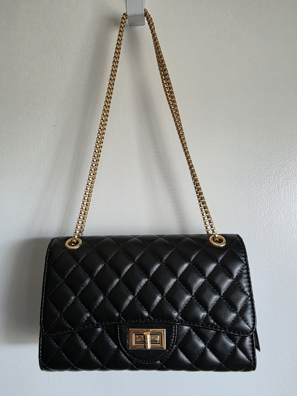 Gladdon Black Quilted Shoulder Bag with Gold Chain Strap.